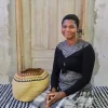 A Pebble (Art Basket) by Mary Ayinbora