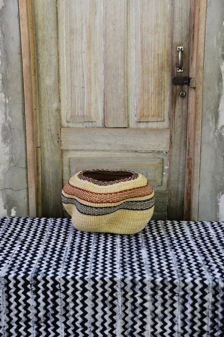 A Pebble (Art Basket) by Mary Ayinbora