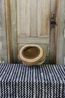 A Pebble (Art Basket) by Mary Ayinbora
